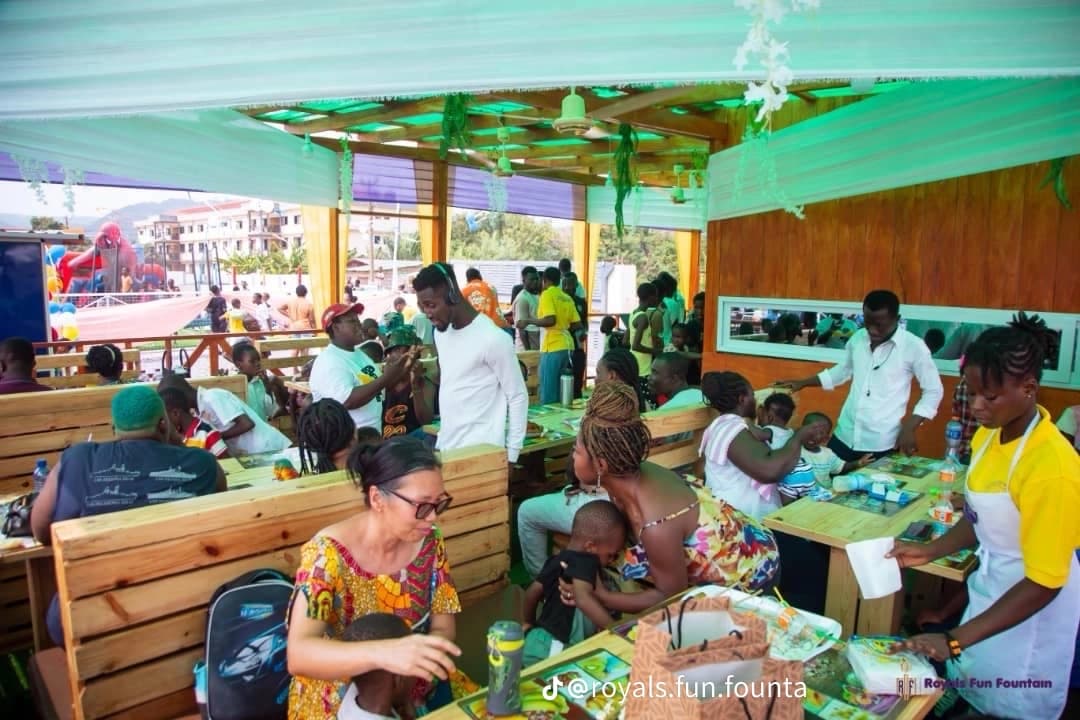 Families eating together in the busy open-air restaurant